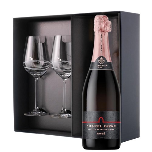 This luxurious gift set is the perfect choice for those who appreciate fine sparkling wine and refined glassware. Featuring a bottle of Chapel Down Rose English Sparkling Wine 75cl paired with two exquisite Venezia Glasses adorned with Swarovski Crystals, this set is beautifully presente